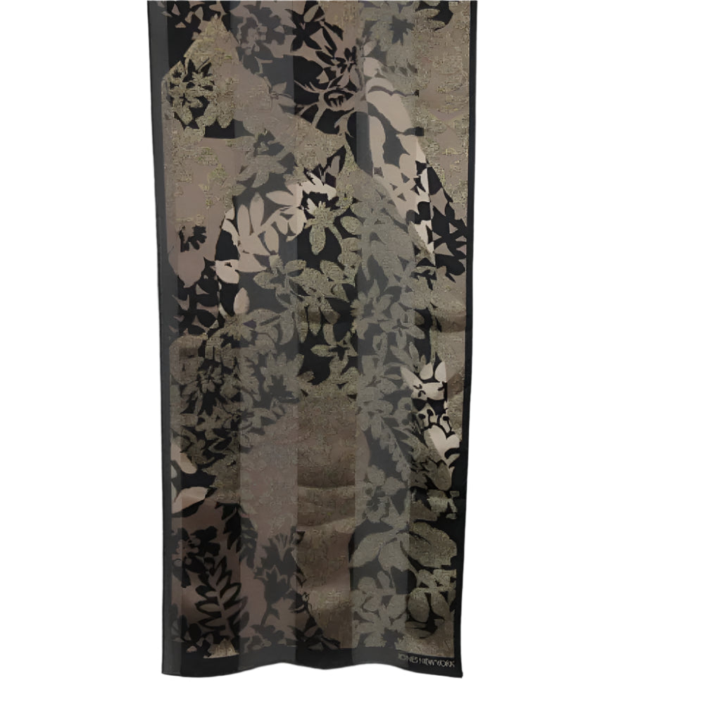 Floral patterned scarf with black, gold, and beige colors on a white background