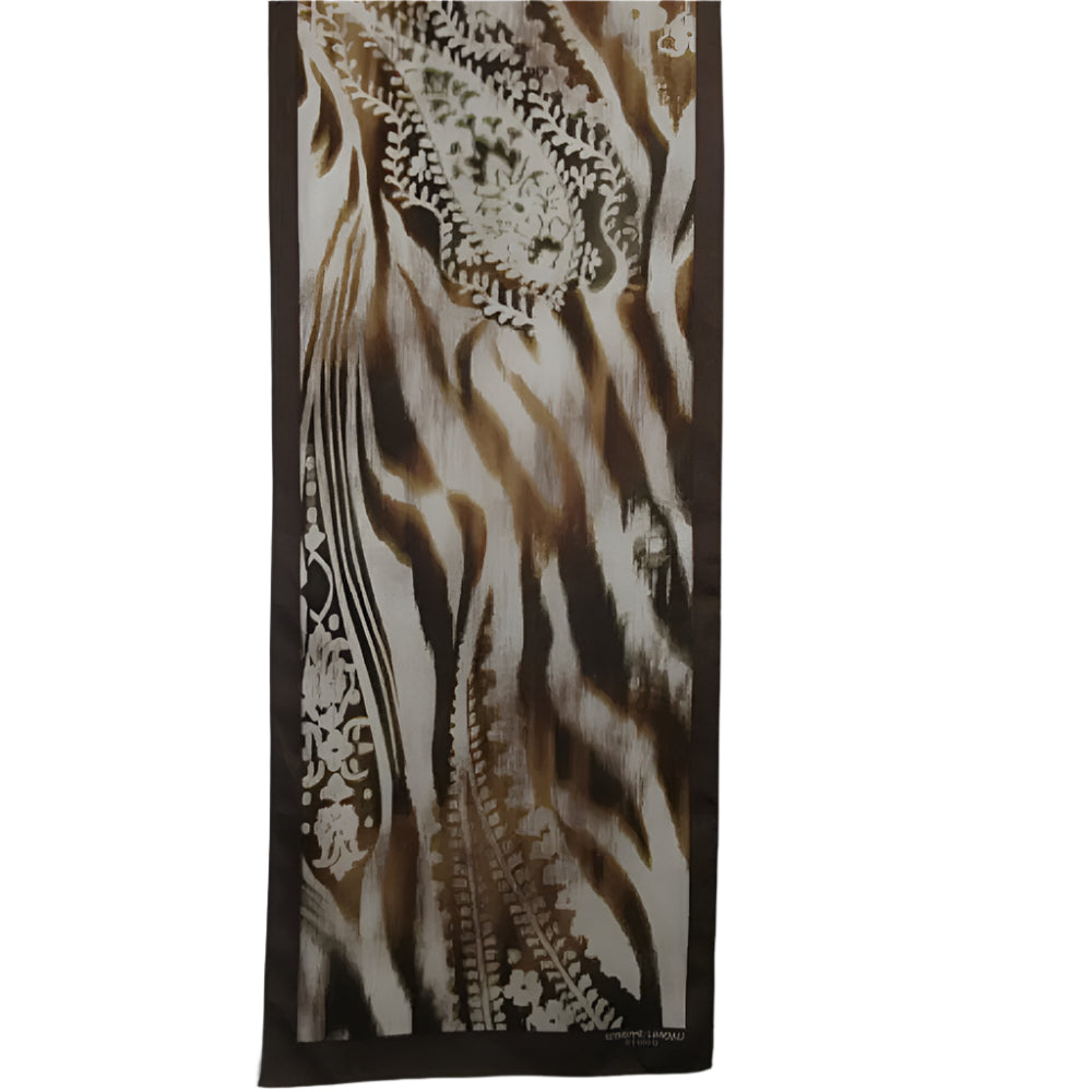 Decorative scarf with zebra print and lace details on a plain background