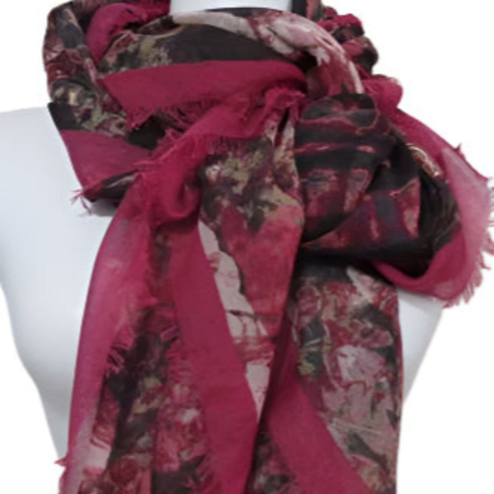 Red and black Vera Wang patterned scarf on a mannequin against a white background