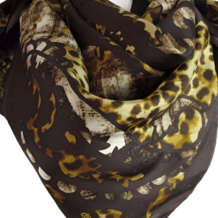 Adrienne Landau Leopard print scarf on a white mannequin with a white background