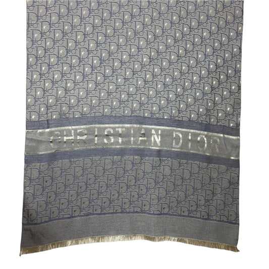 Christian Dior scarf with logo pattern on a white background