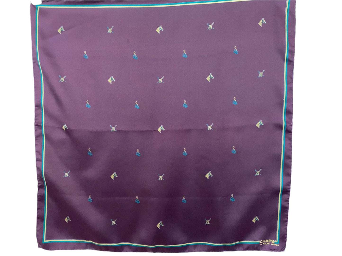 Purple Ralph Lauren scarf with small geometric patterns on a light blue background