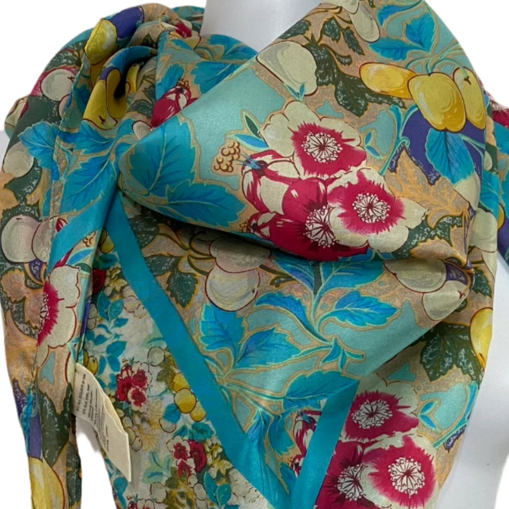 Colorful floral scarf with tassels on a mannequin. Boho Chic - Johnny Was